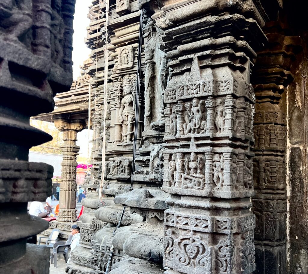 The intricate carvings on the walls of the temple