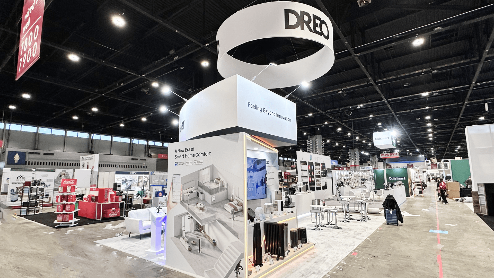 DREO IHS 2025 20x30 island booth at McCormick Place – overhead ring sign rigging and demo counter layout for smart home comfort appliances