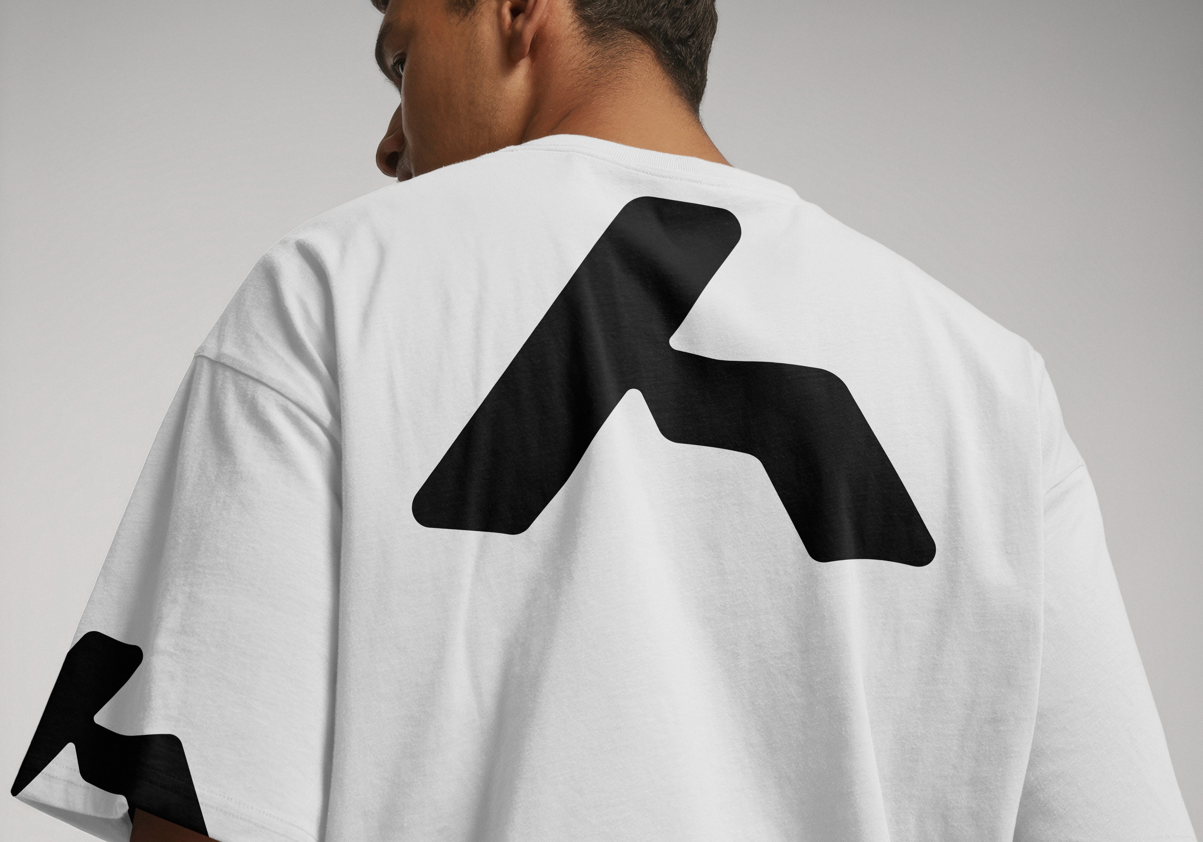 Image of man in branded tshirt