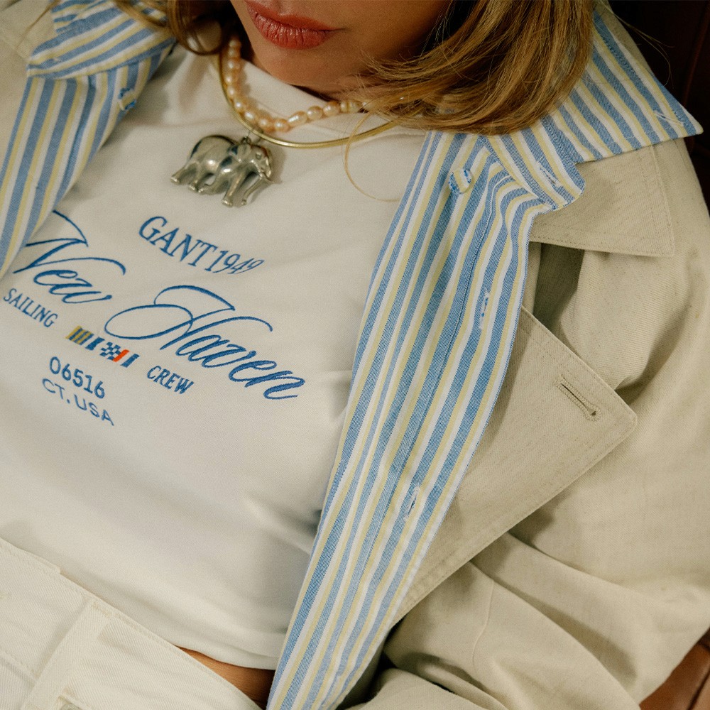 Streetside billboard with flyposters of the Batch.Works brand and illustrations