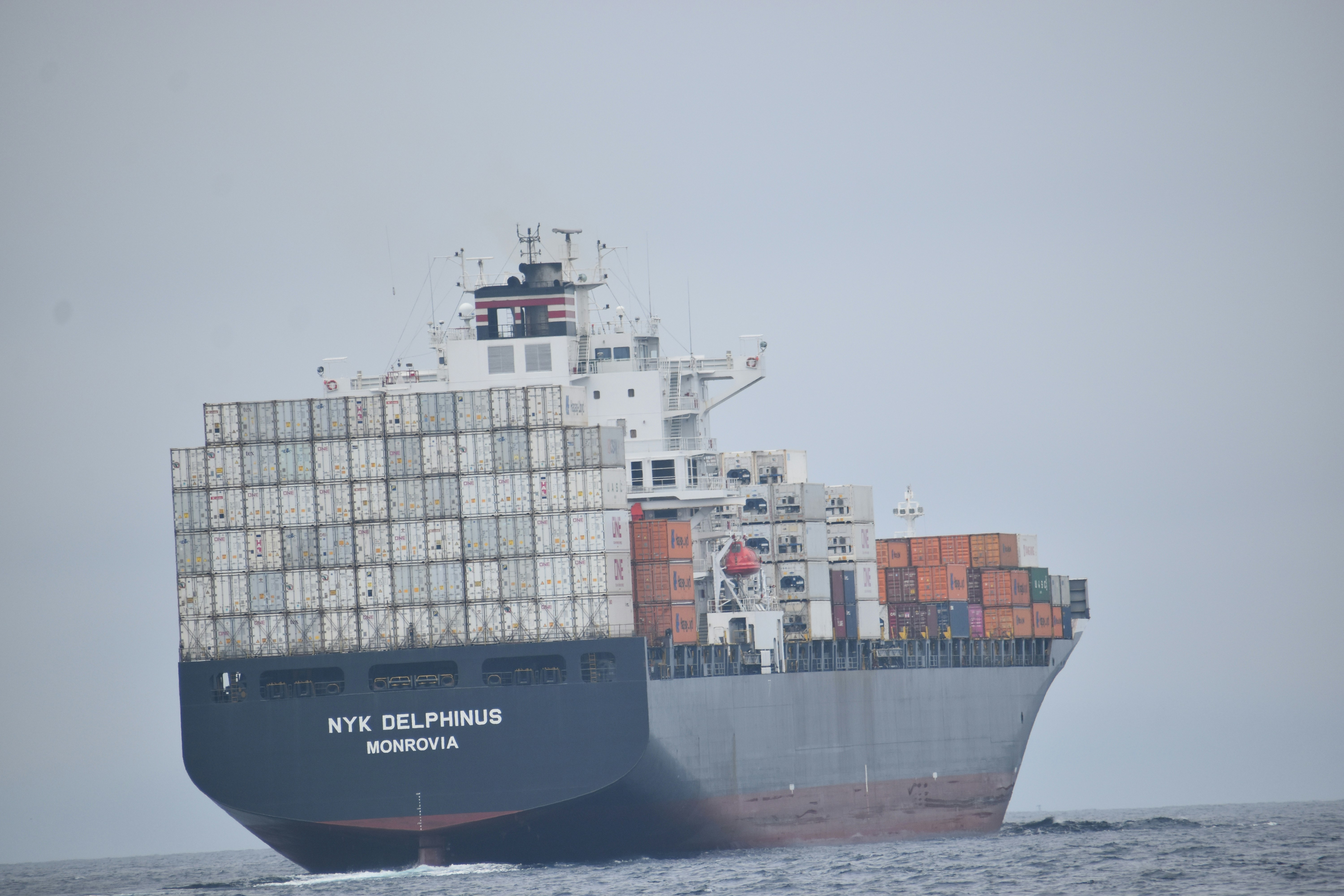 a large ship with containers on it