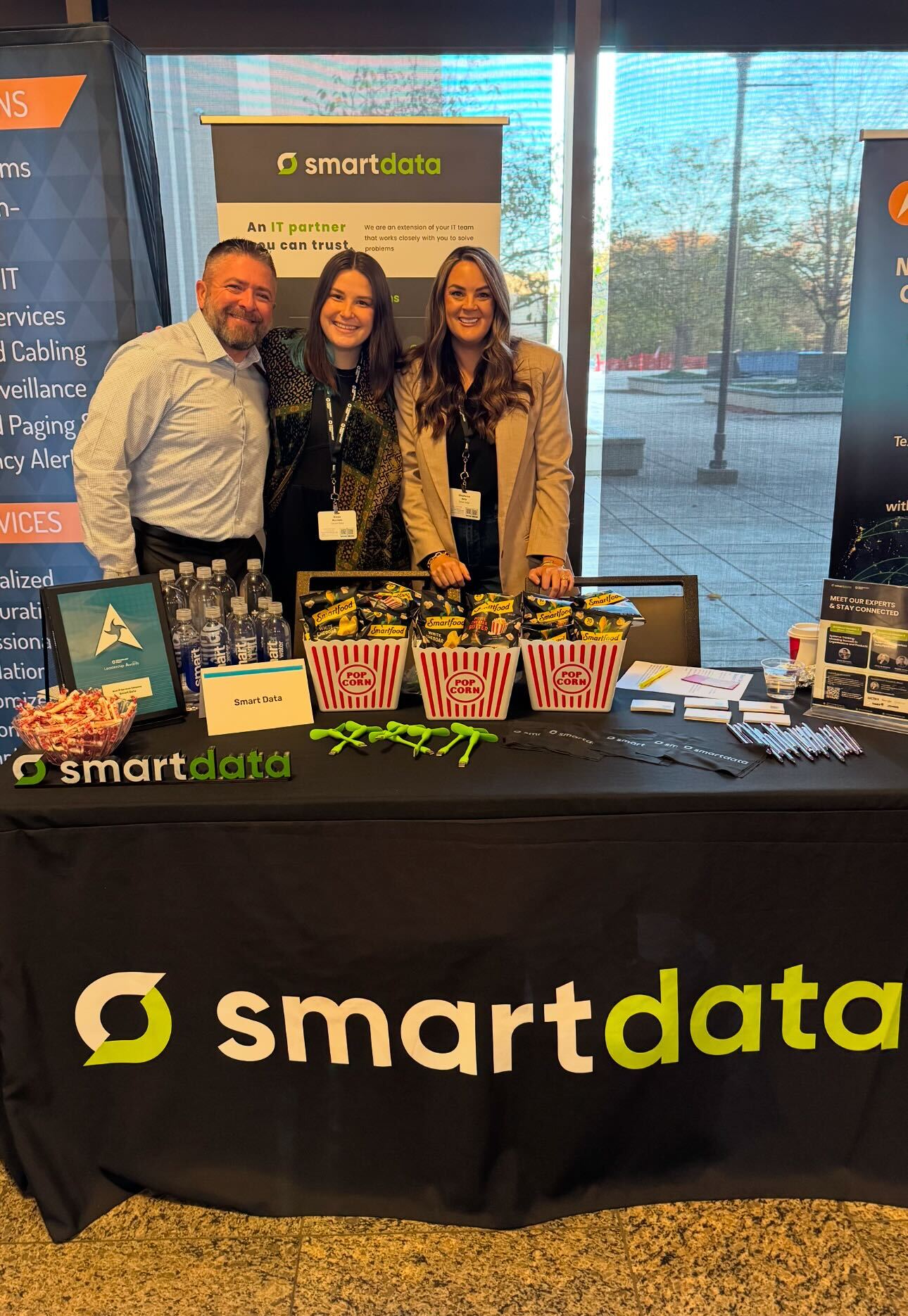 Smart Data Employees at a booth at an event
