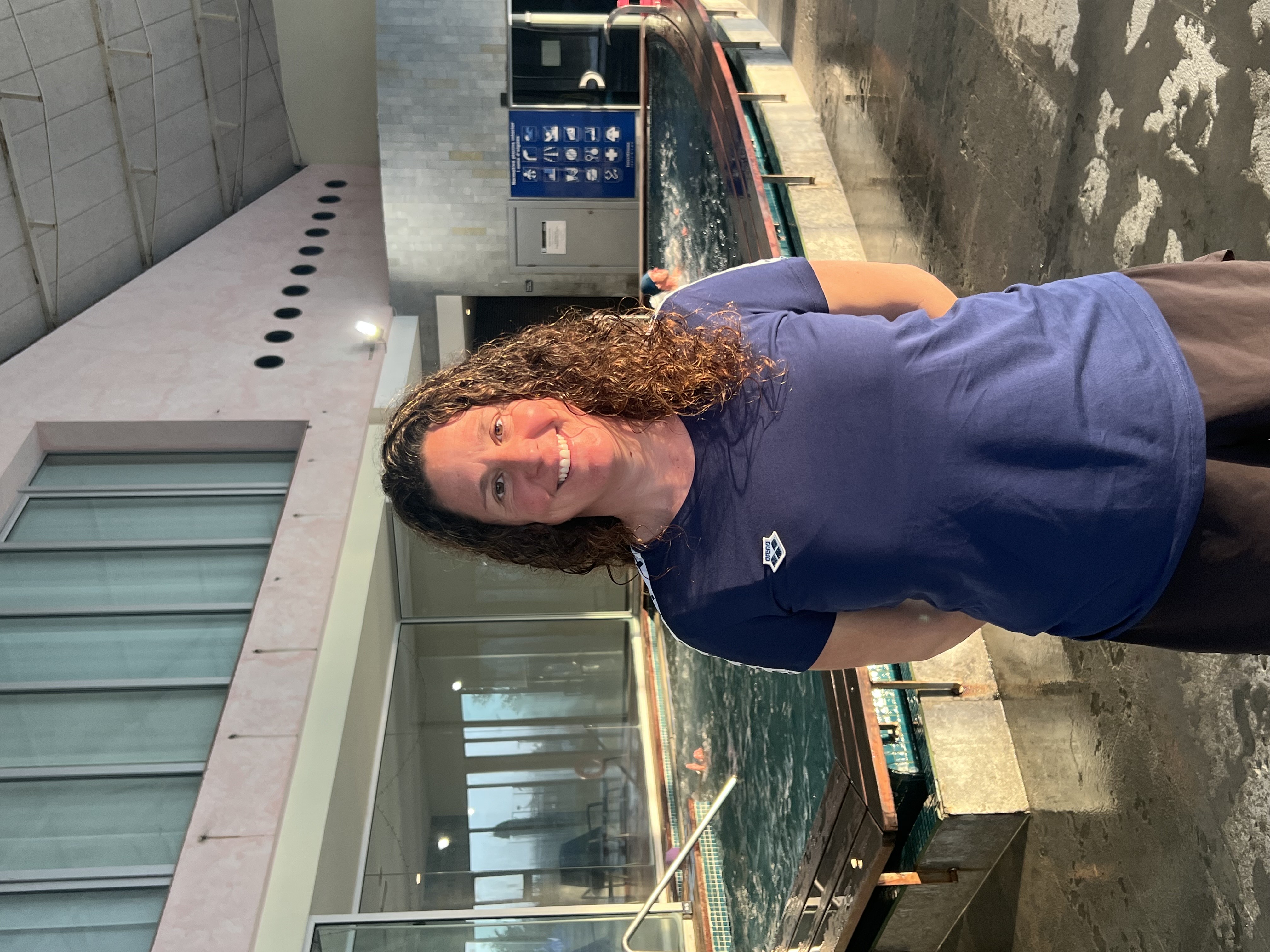 A lady with surfboard