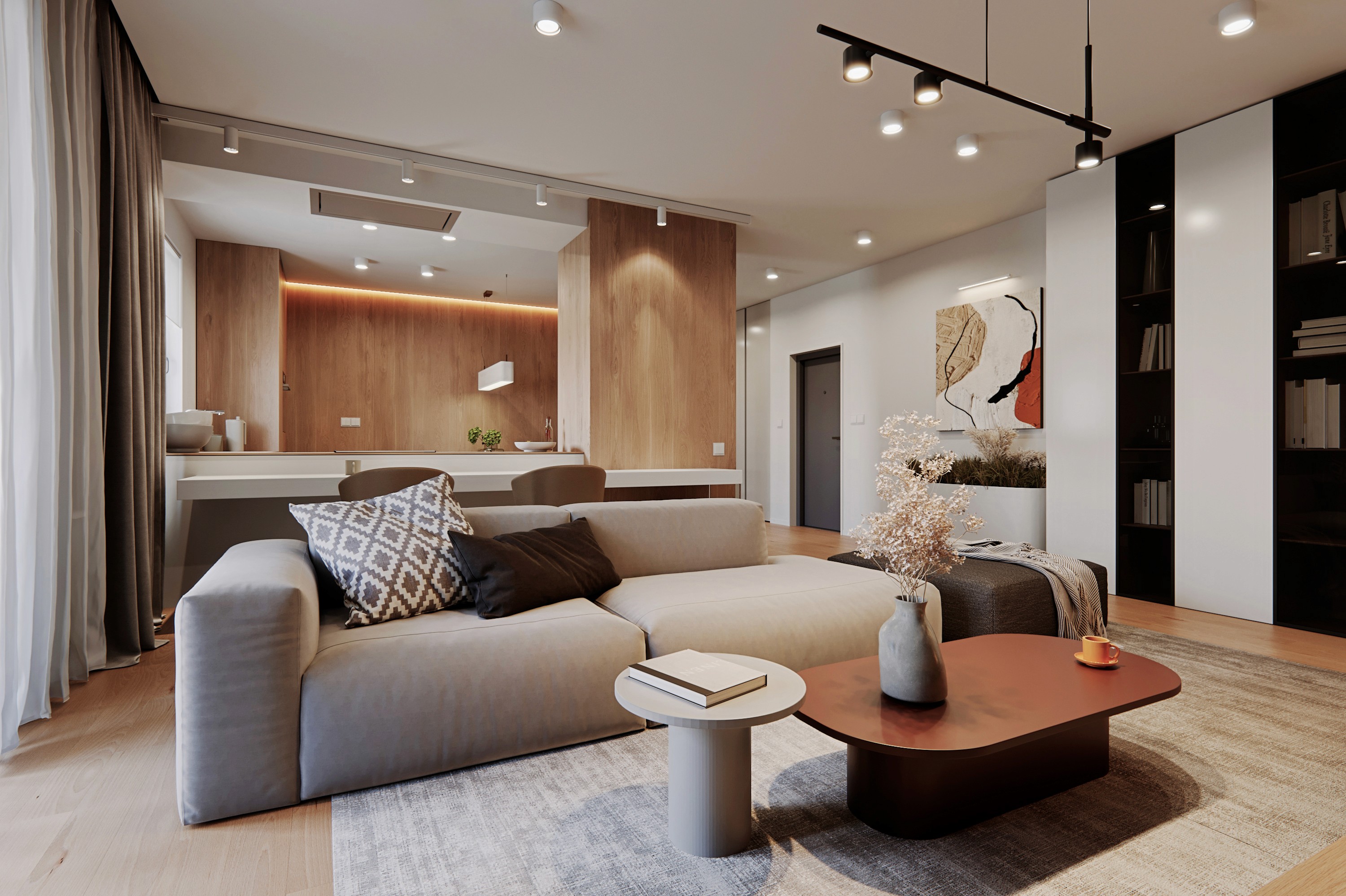 Contemporary living area with custom furniture and open kitchen design