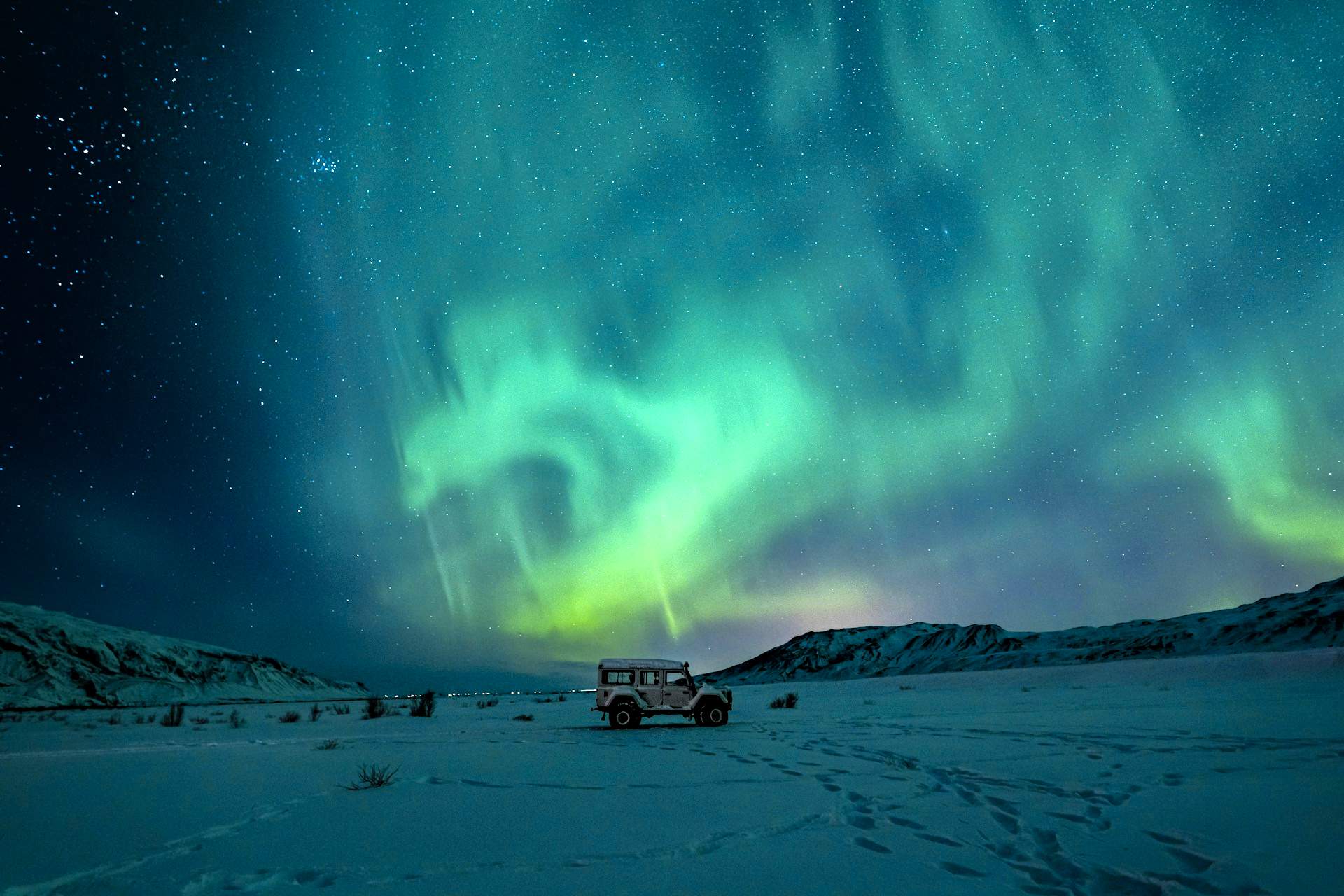 three brown wooden boat on blue lake water taken at daytime
