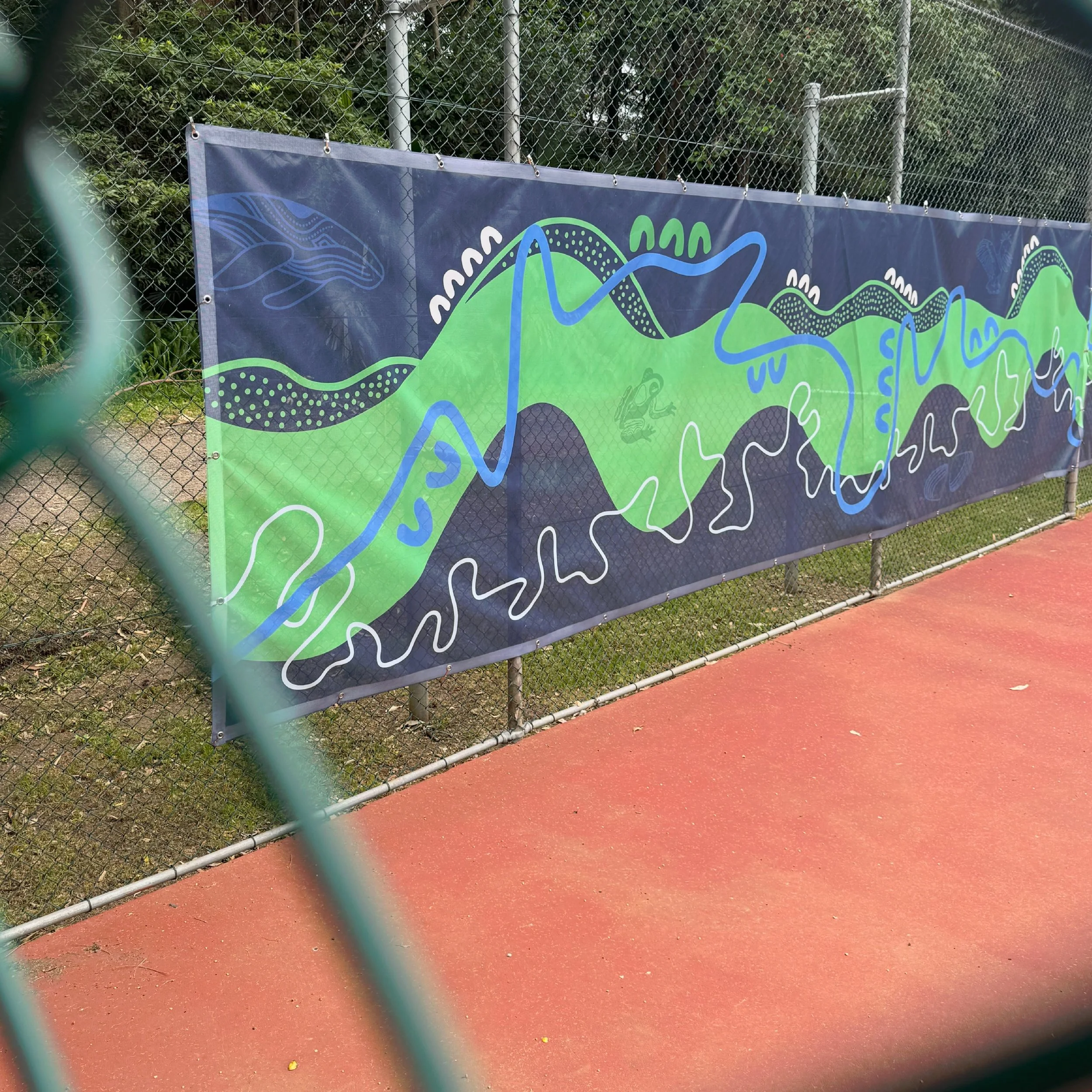 A black and white studio photograph of Stacey Saunders standing confidently in a black blazer dress and heels, holding a megaphone at her side. Bold red typography surrounds her reading "Unfiltered Stories of Women in Branding." The Badass B*tches in Brand logo sits in the bottom right corner.