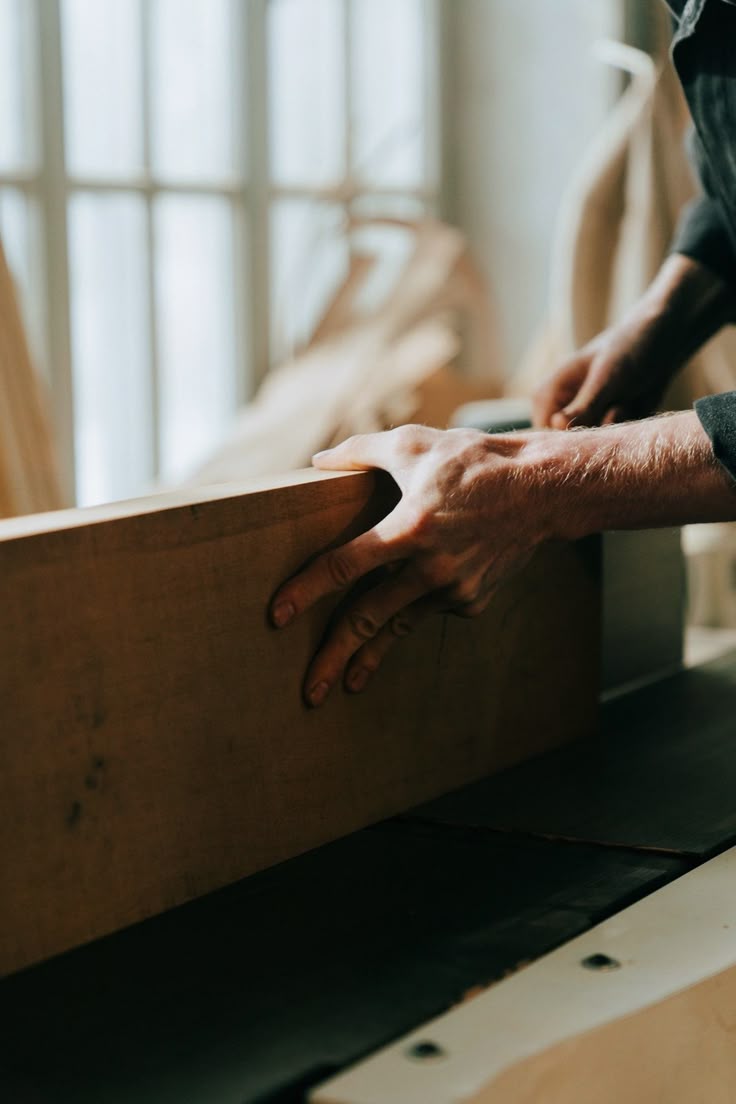 Carpenter working with timber