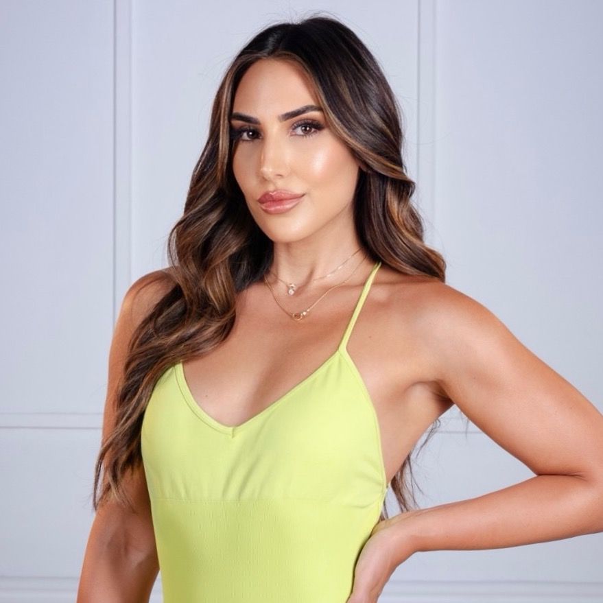 a close up of a person with a smile on her face