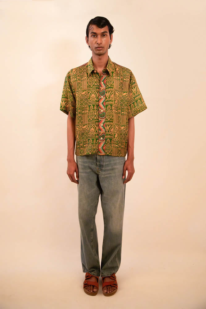 Printed green  silk shirt featuring piping detail, handcrafted from vintage fabric with a relaxed fit and a focus on conscious, artisanal design