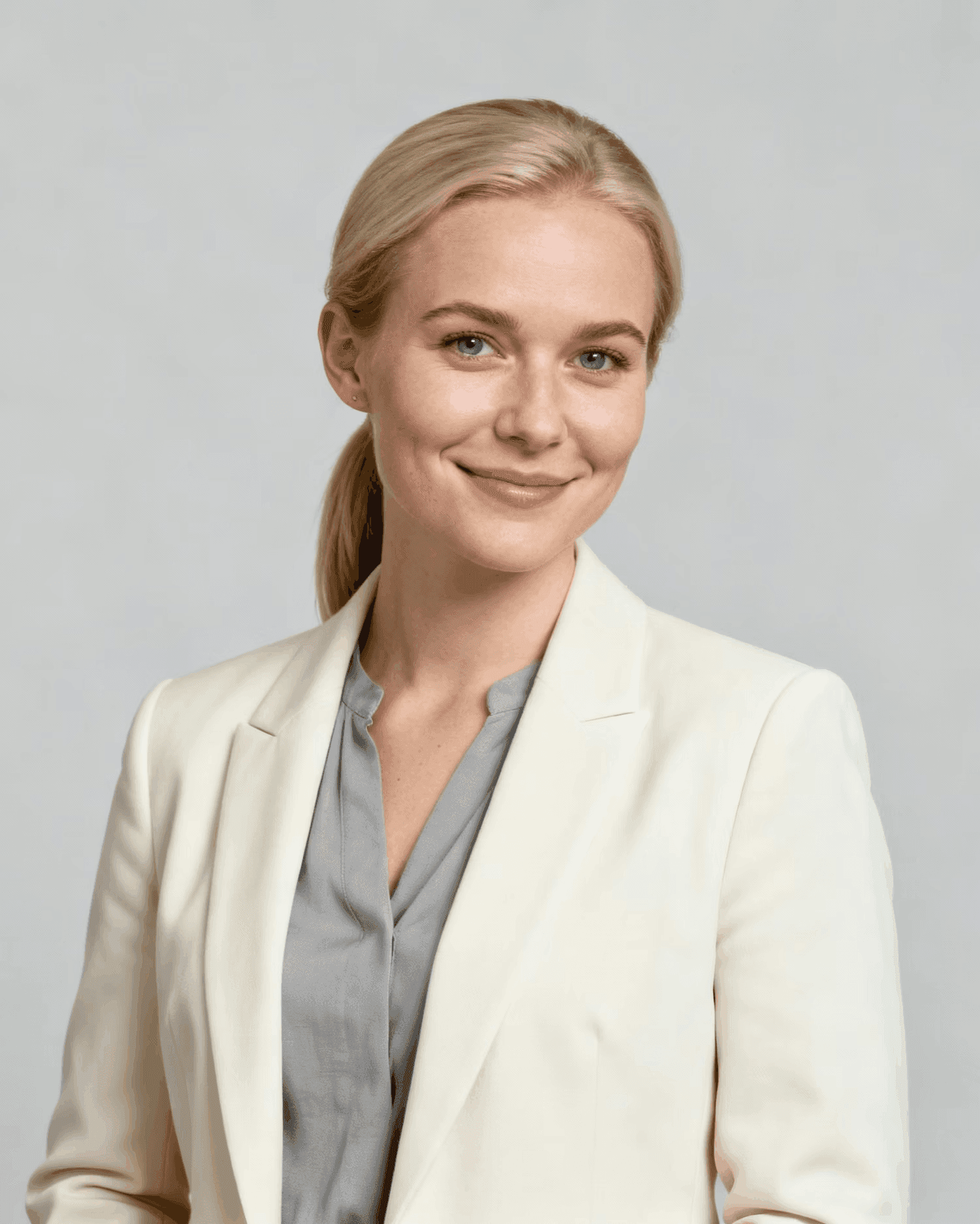 Professional woman in white blazer corporate portrait