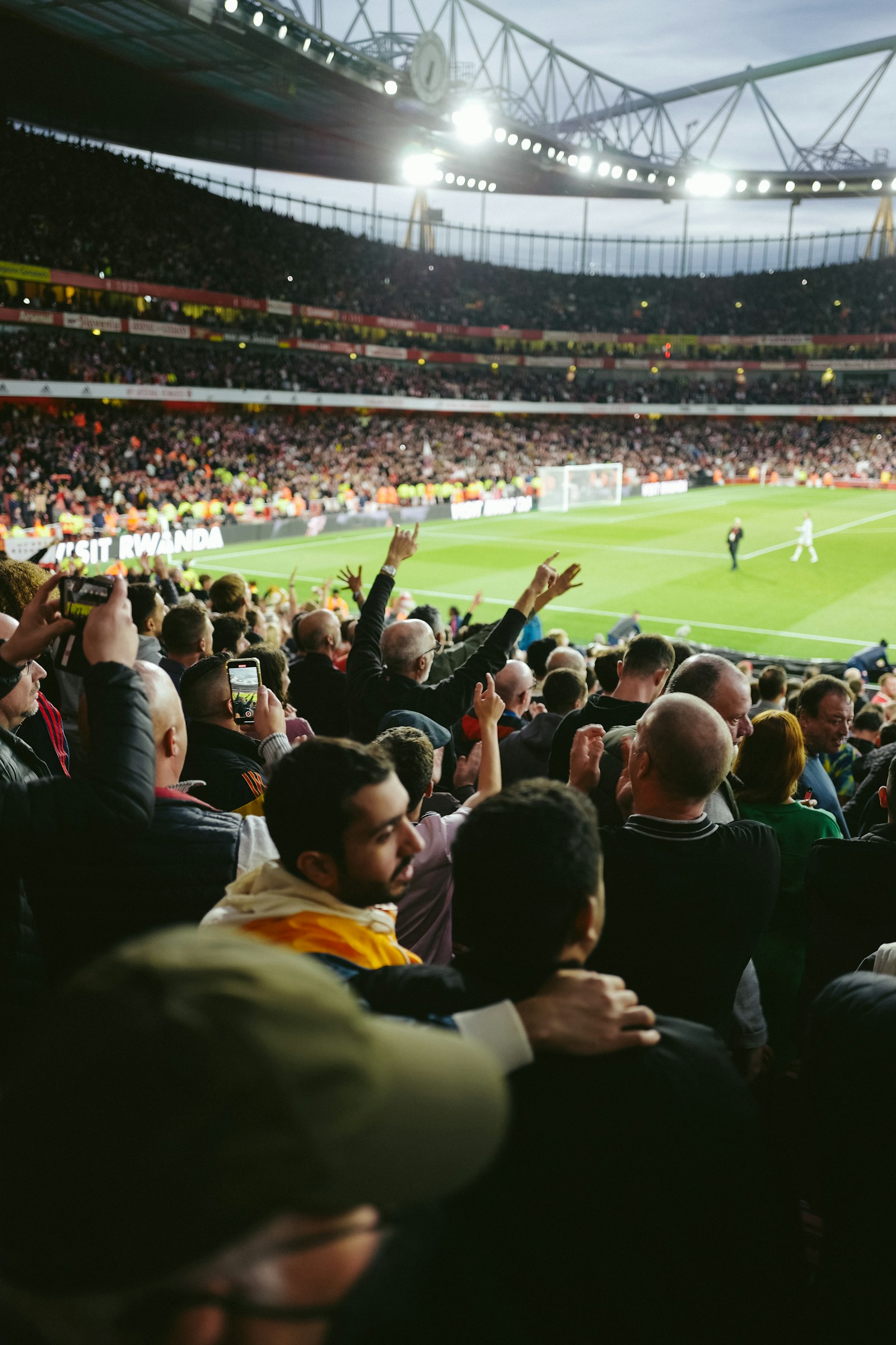 A crowd of people in a soccer stadium