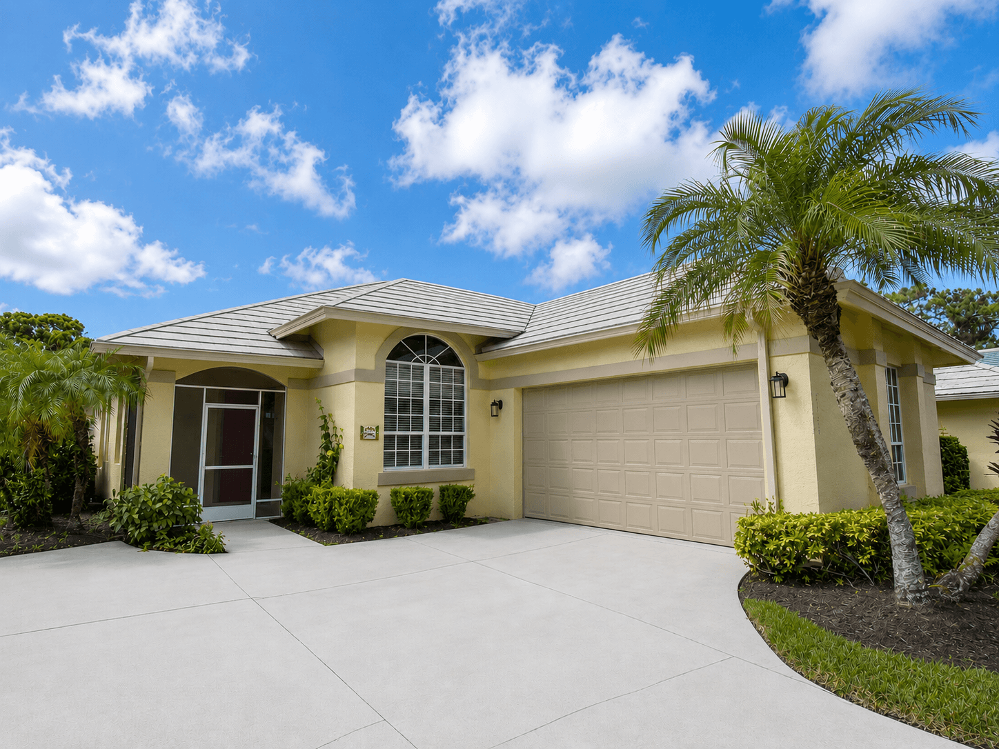 1995 New Roof Construction in Hawks View, PGA Village, Port St Lucie with Entegra Flat Broomswept Tile in Natural Gray