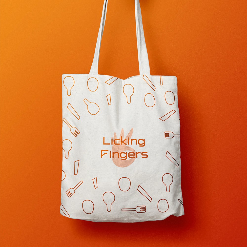 Bold, colorful food brand packaging for Licking Fingers restaurant