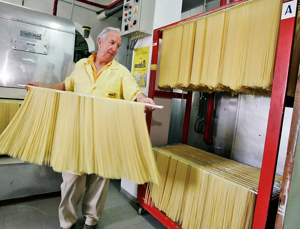 Three women at a table with drinks