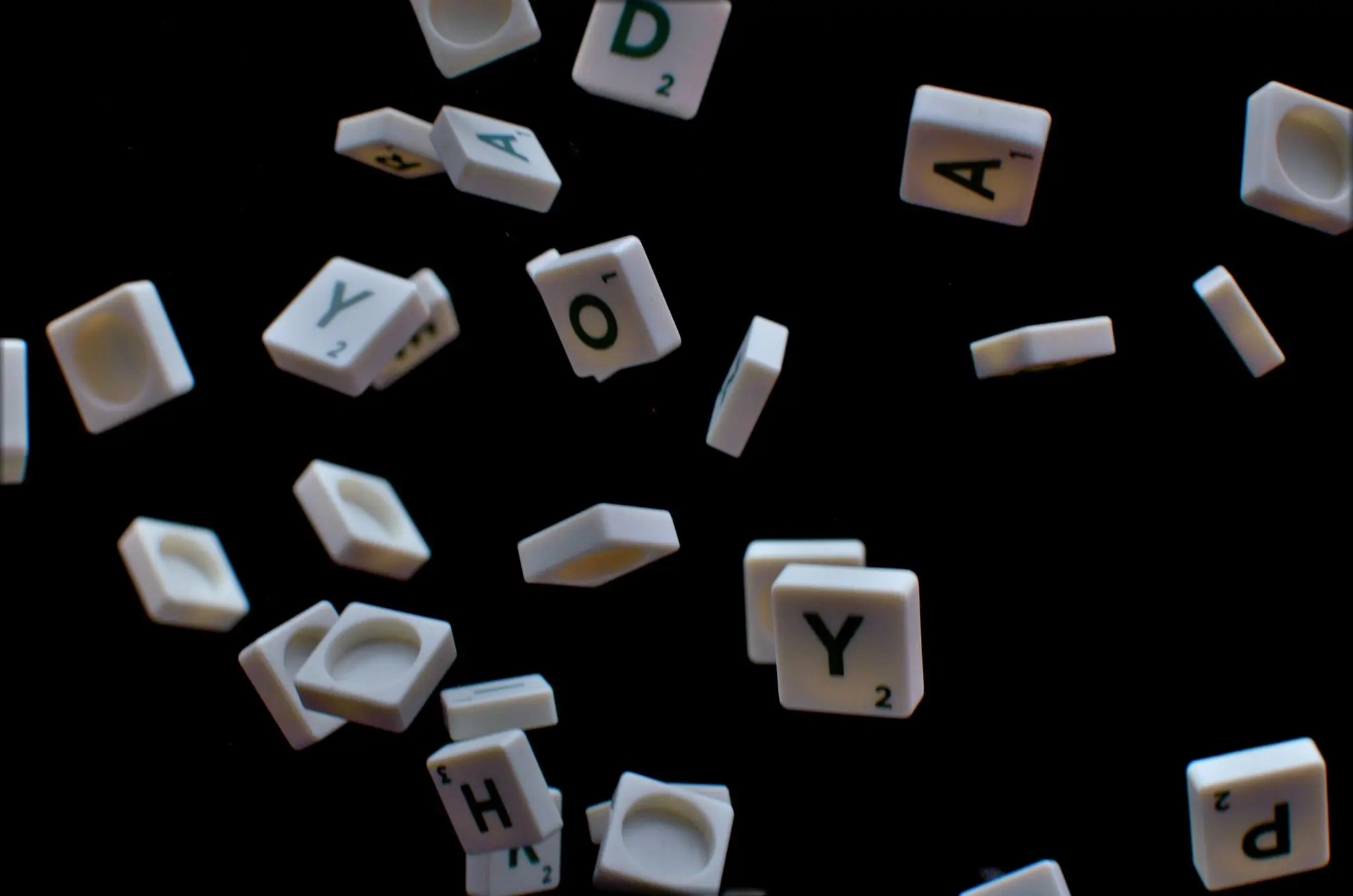 alphabets from a computer keyboard floating in the air - a photographic representation of Dyslexia