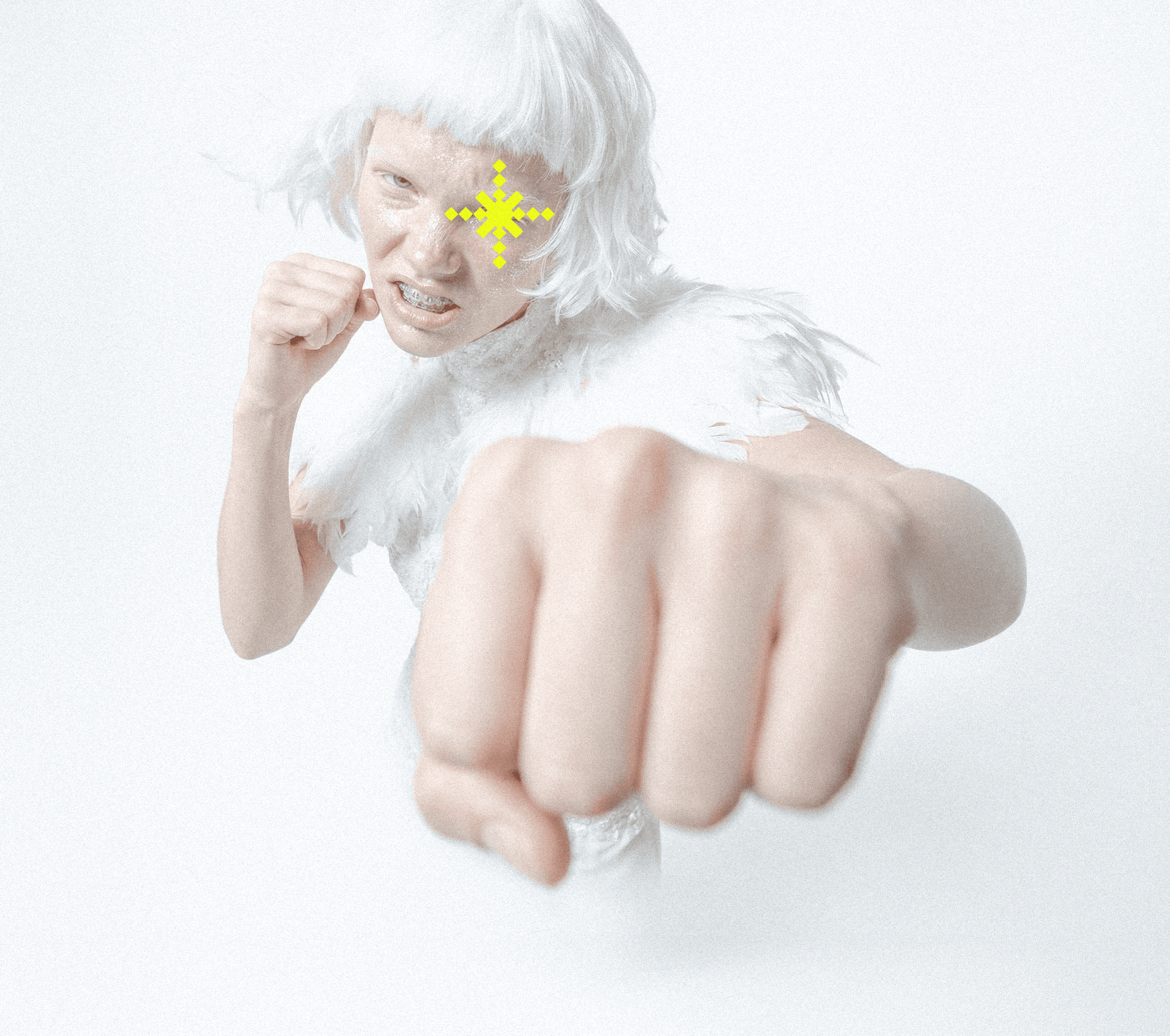 two tennis rackets and balls on a blue tennis court