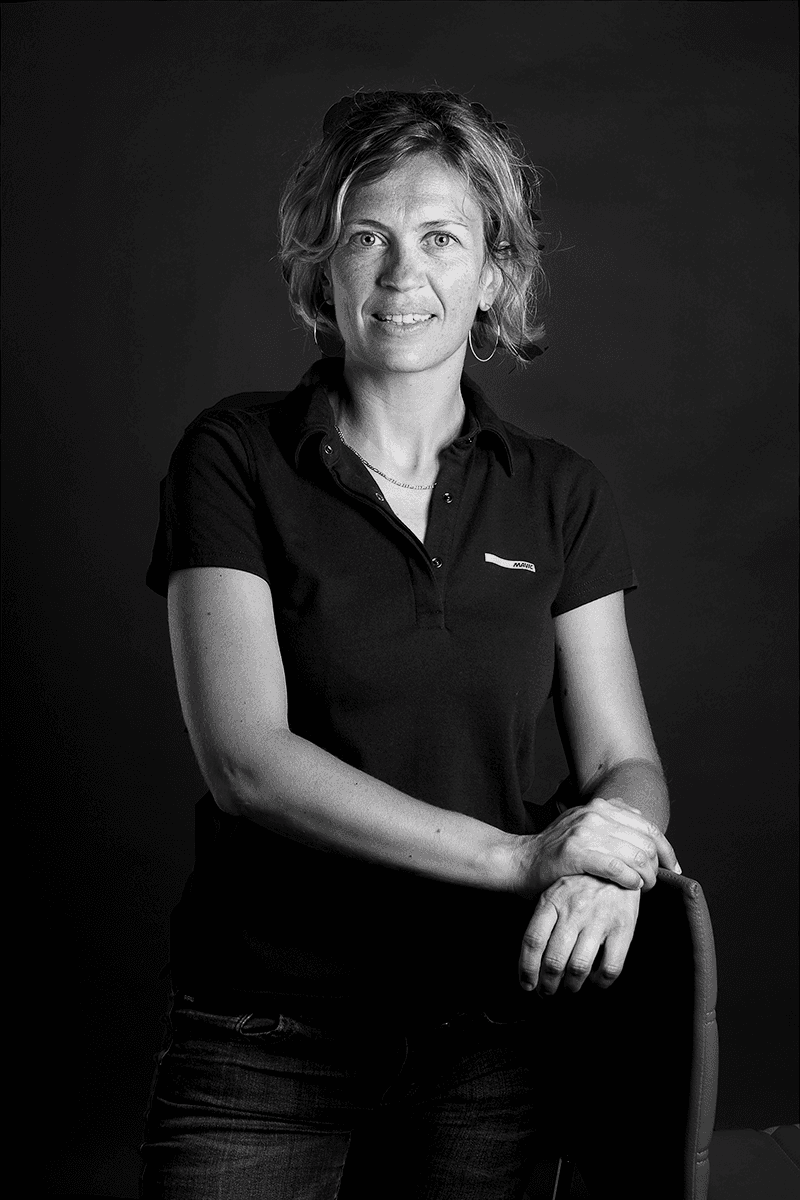 a woman holding an apple