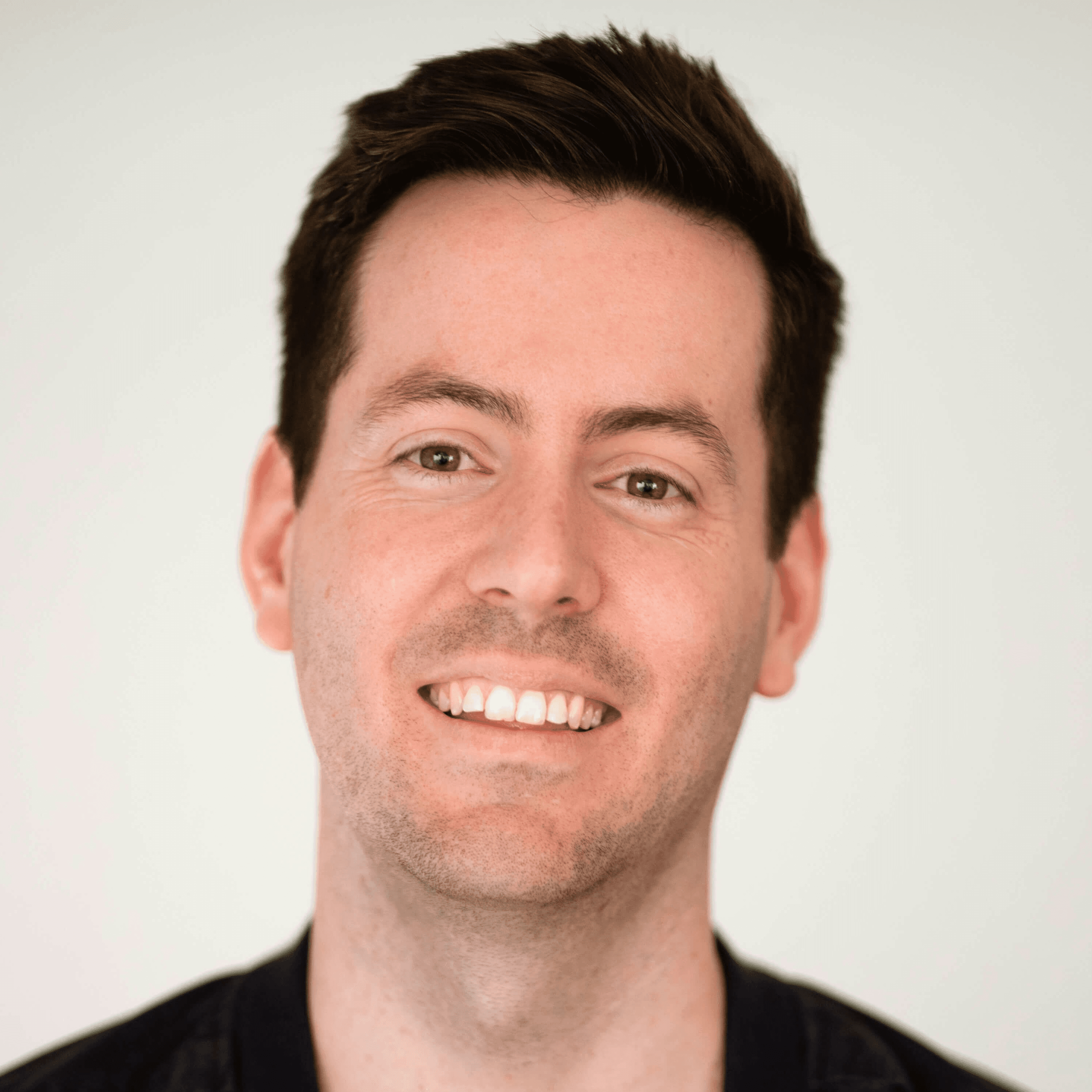 a man smiling for the camera