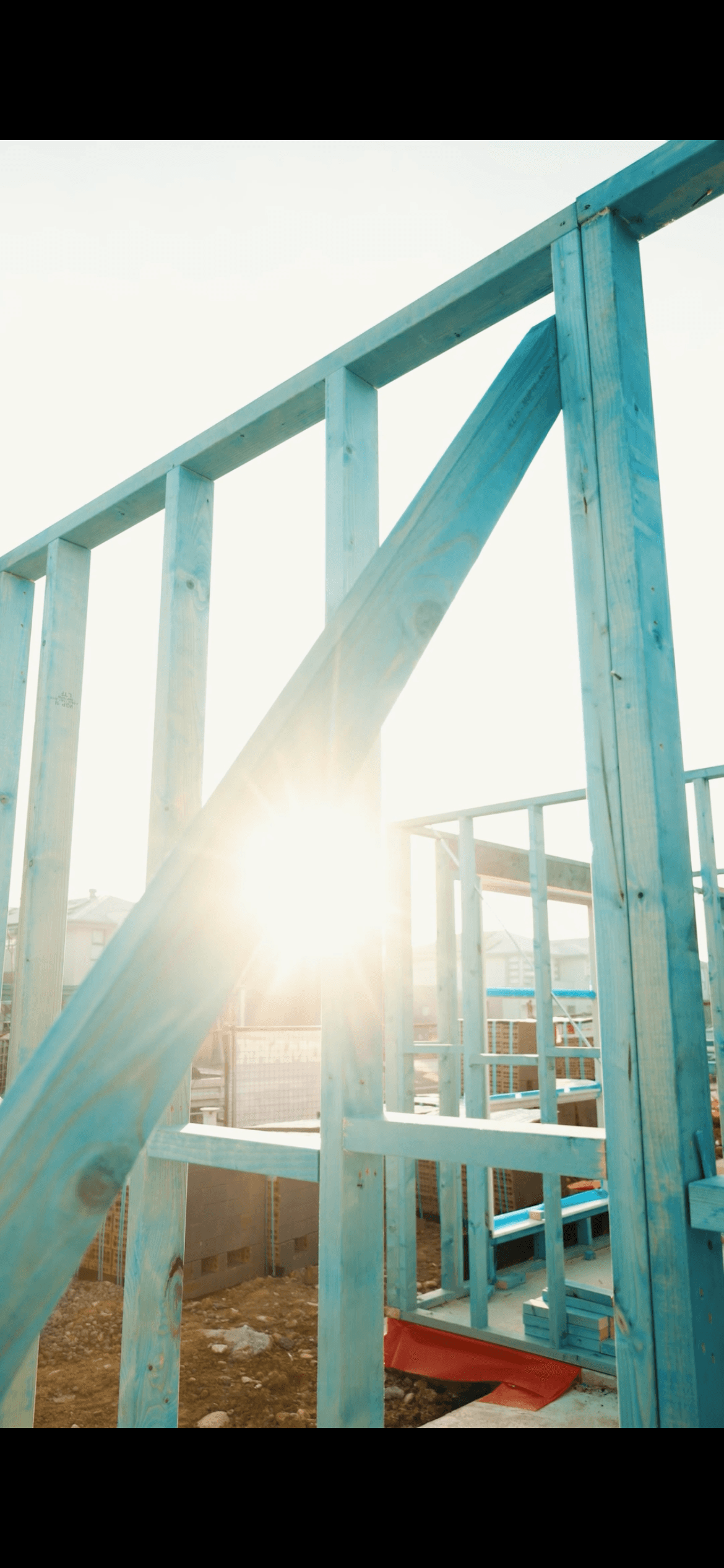 Single-story villa with wide glass walls and warm interior lights, Amberline Villas