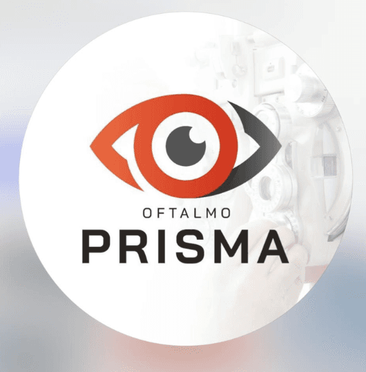 A person with short, curly blond hair wears a bright orange turtleneck sweater. The background is plain, creating a calm and focused portrait look.