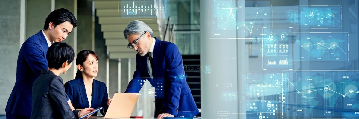 Elementera consultants strategizing AI solutions with clients, including AI readiness assessment, opportunity identification, and strategy planning