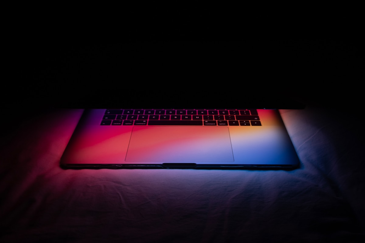 Laptop with red and purple glow
