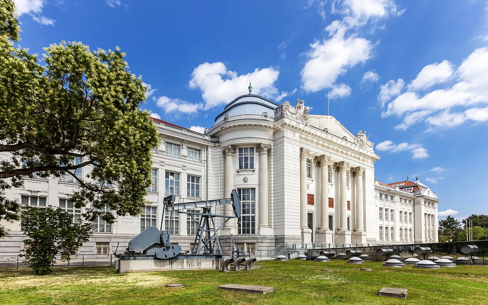 Vienna Museum of Science and Technology exterior with machinery display.