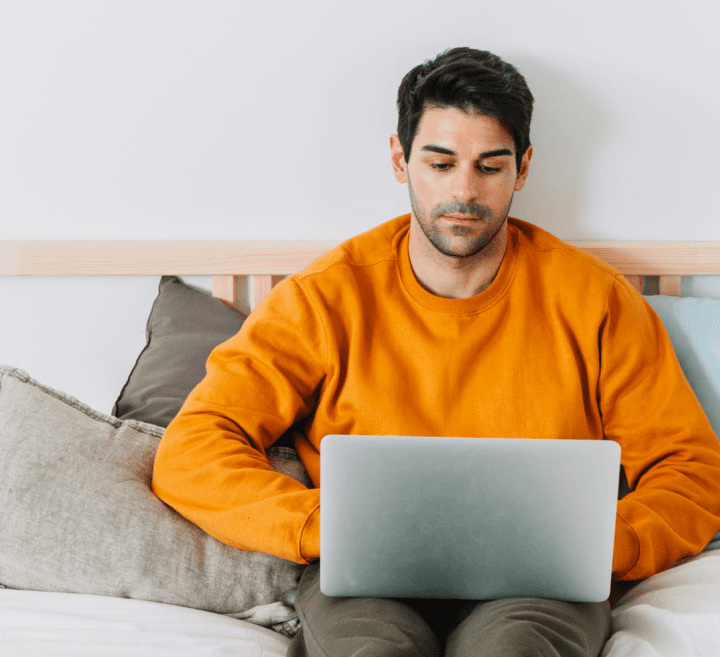 young boy using laptop