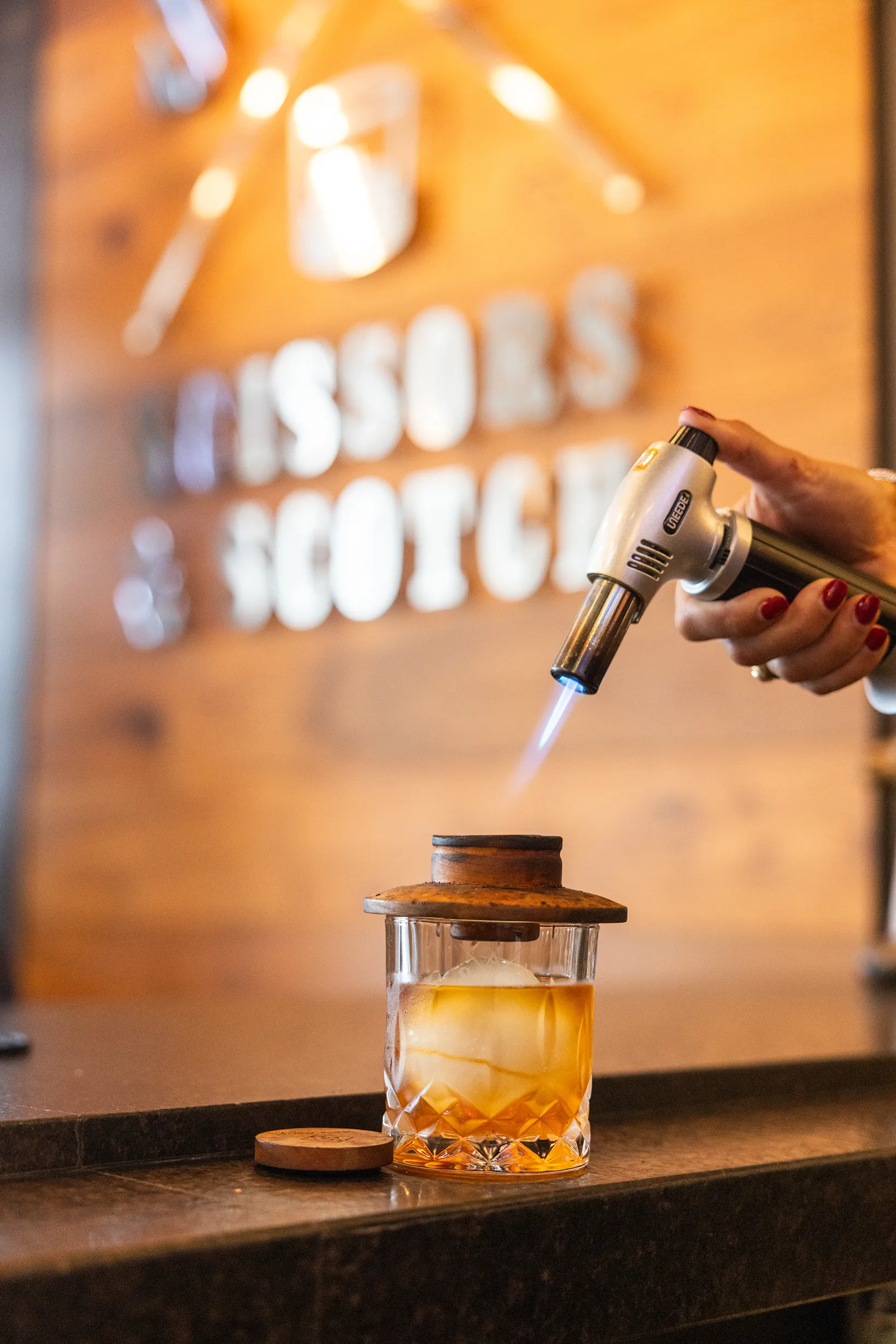 Quarry Village plaza with Piranha Izakaya sign visible.