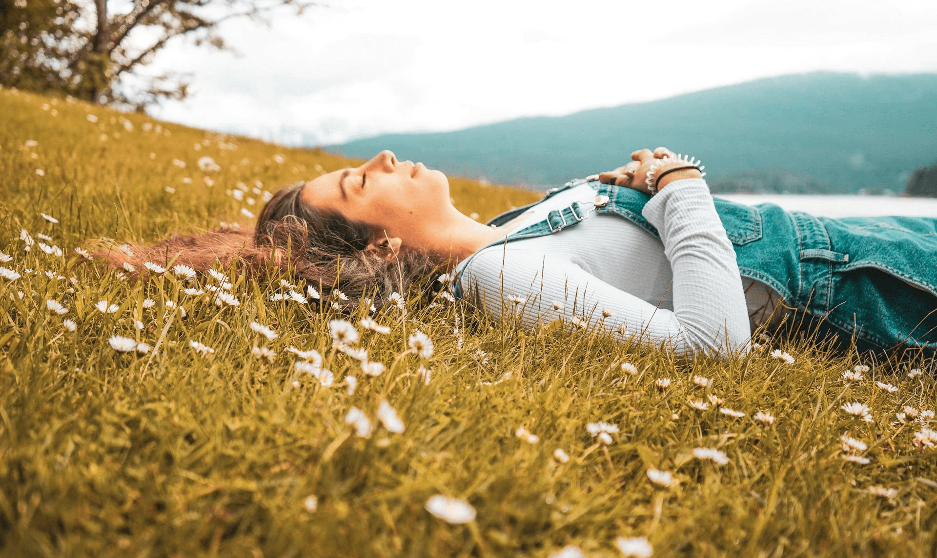 Woman in deep rest, immersed in nature