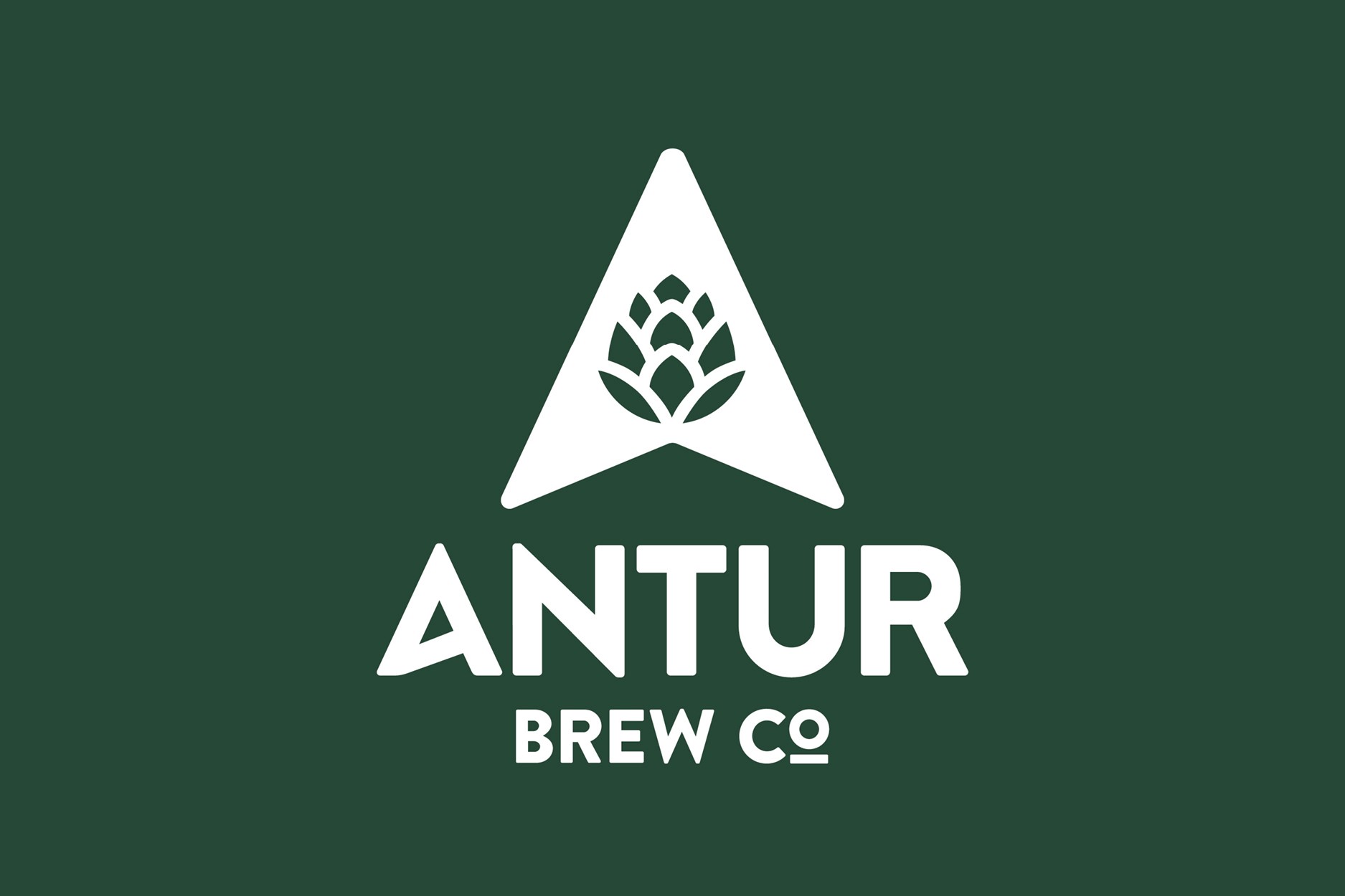 Antur Brew Co logo featuring a white hop inside a triangle above bold typography on a dark green background.