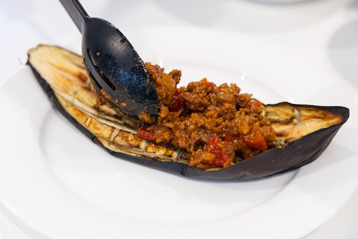 Cheff stuffing Eggplant Parmigiana