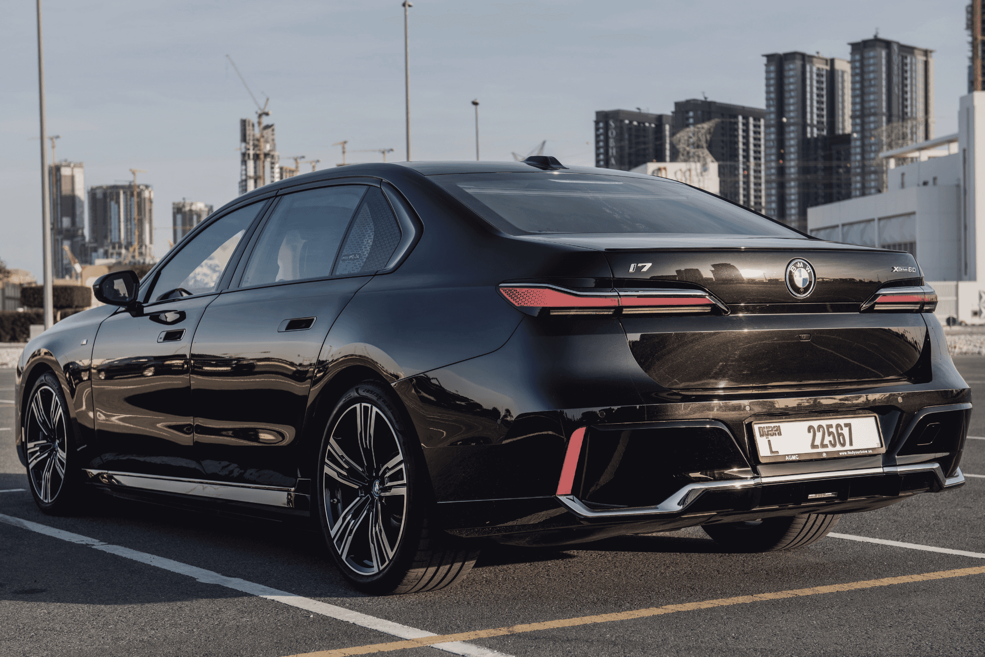 Black BMW i7 series sedan parked in a parking lot