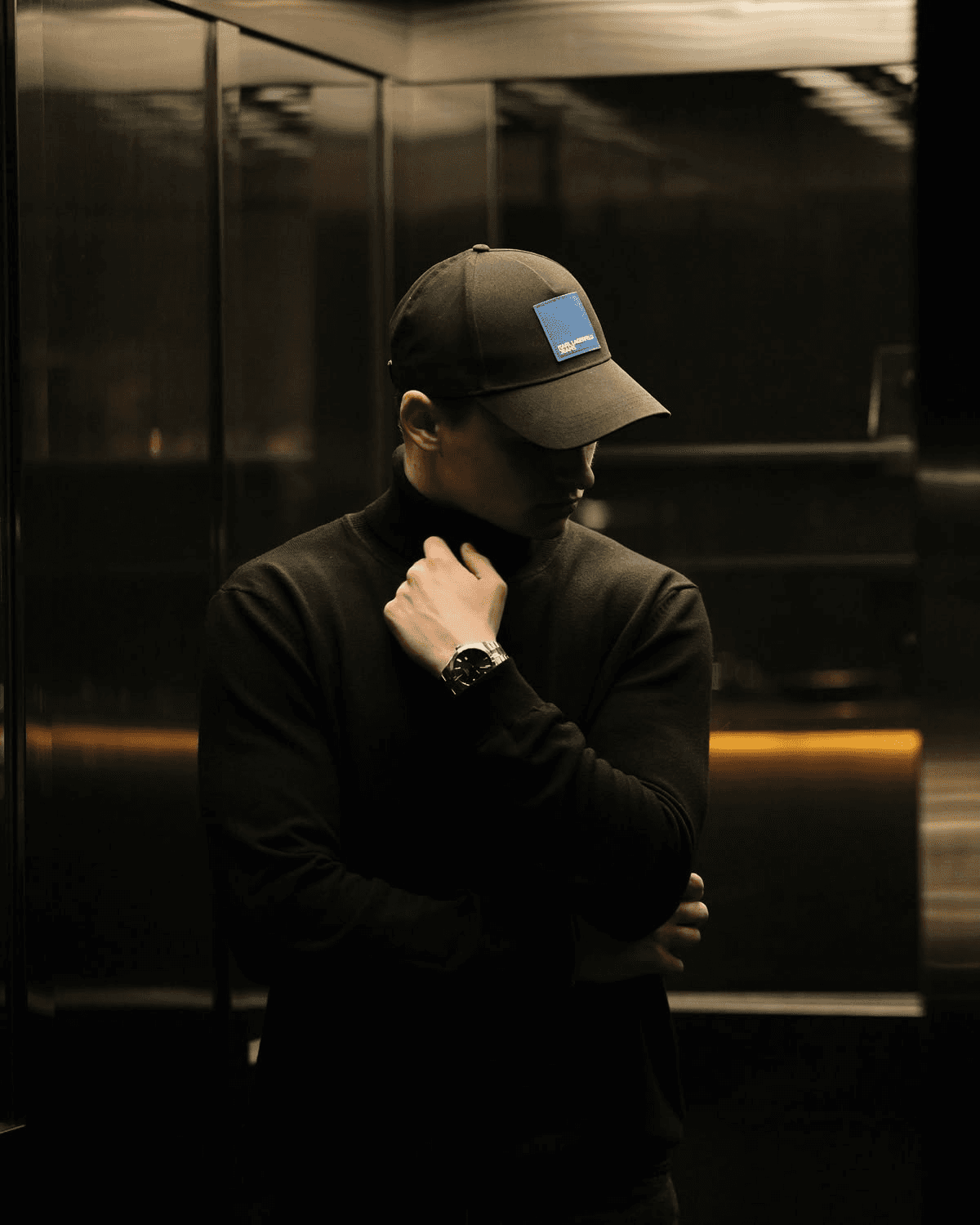 Guy wearing cap looking side