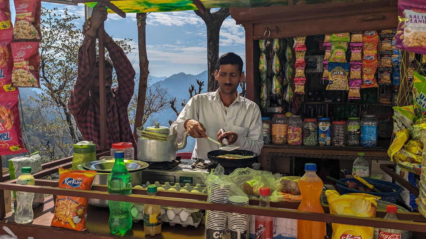 A semi-blind seller on the mountain road in Rishikesh after neer waterfall