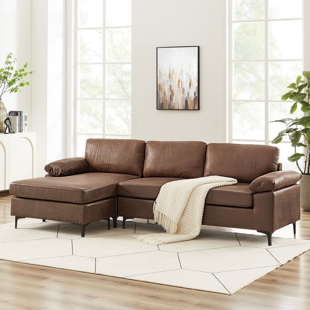 Faux suede sectional sofa with a modern aesthetic, ideal for adding elegance and comfort to contemporary spaces.