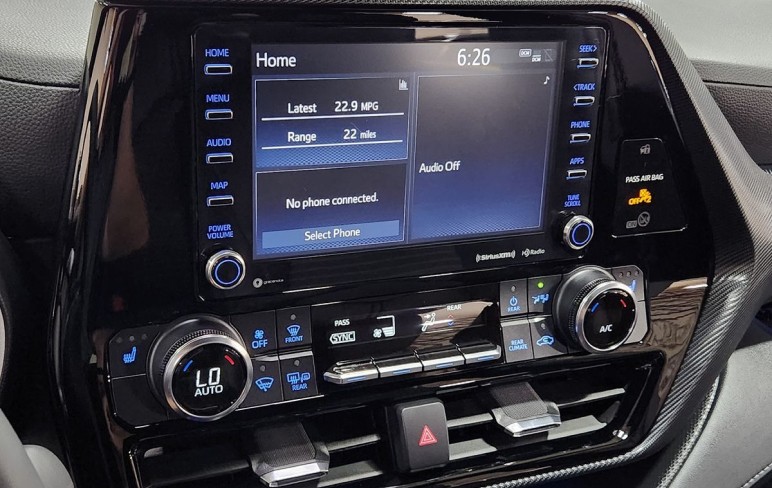 black car steering wheel during daytime