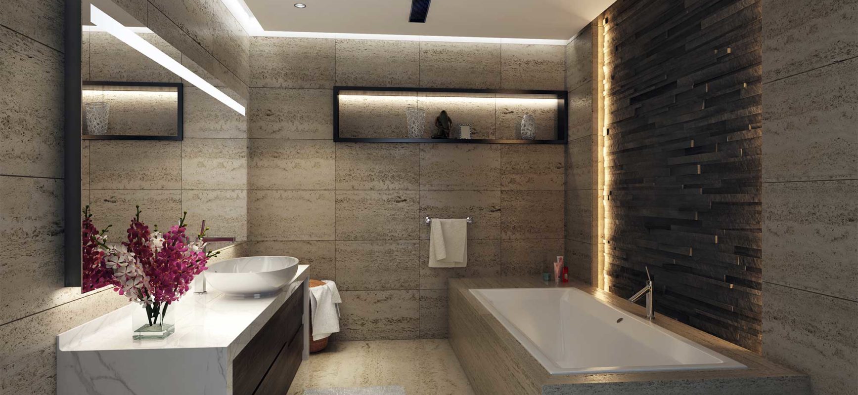 High-end bathroom featuring a marble vanity, integrated lighting, and a deep soaking tub in Business Bay.