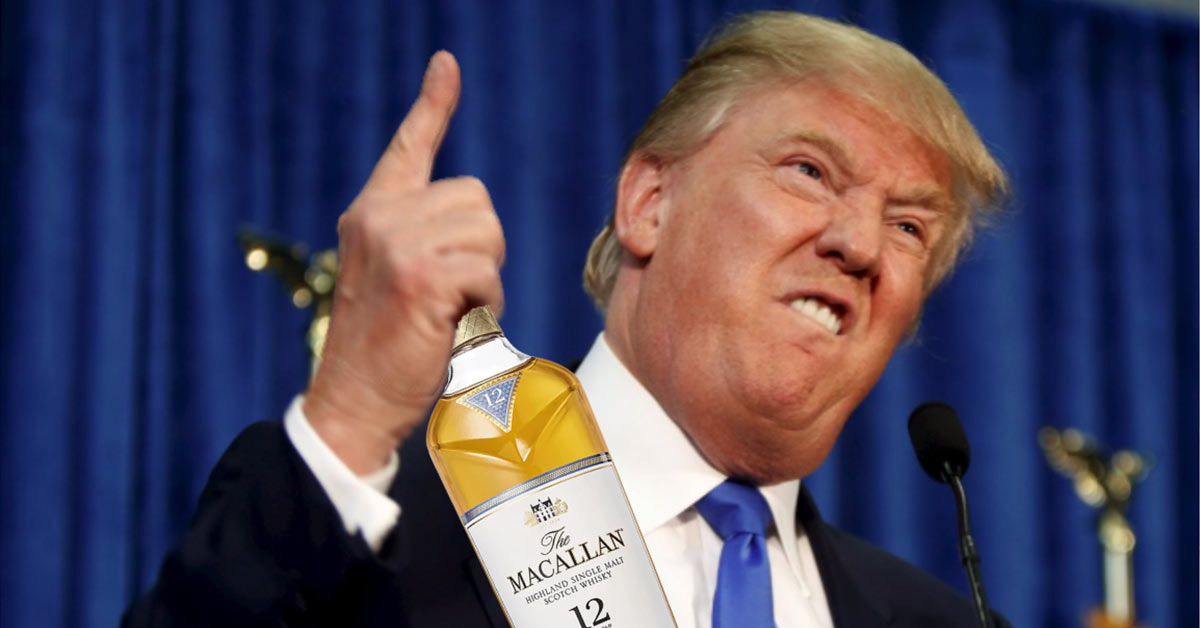 president donald trump holding bottle of whisky