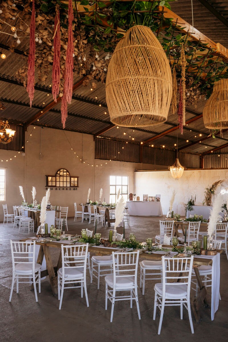 Wide shot of elegant wedding reception setup at Lombardini estate