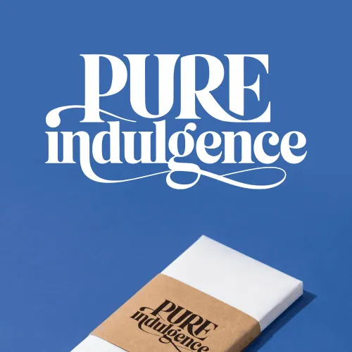 Minimalist typography and branding for 'Pure Indulgence' on a deep blue background. By a branding expert