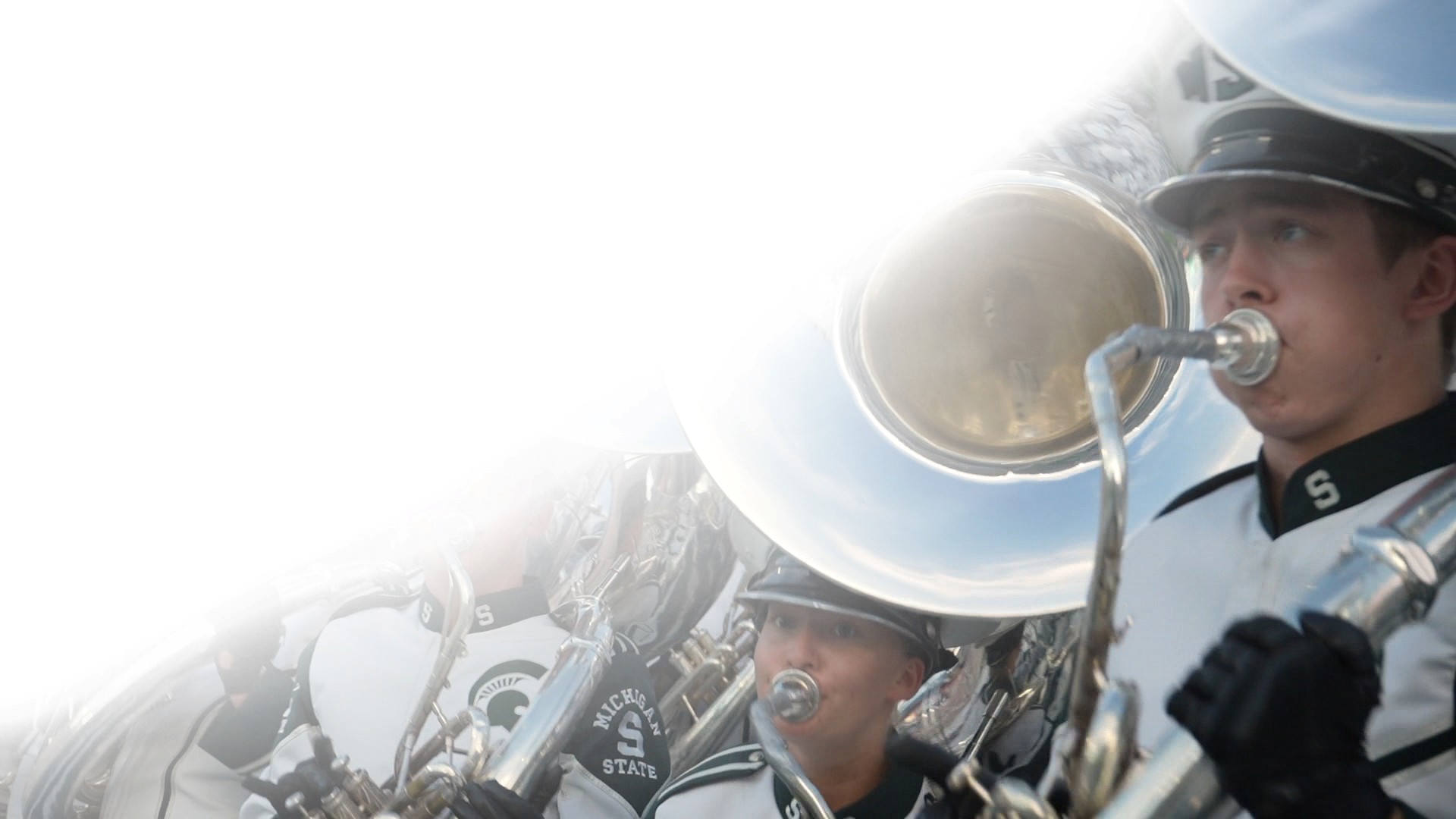 Spartan Marching Band Tubas in the stands