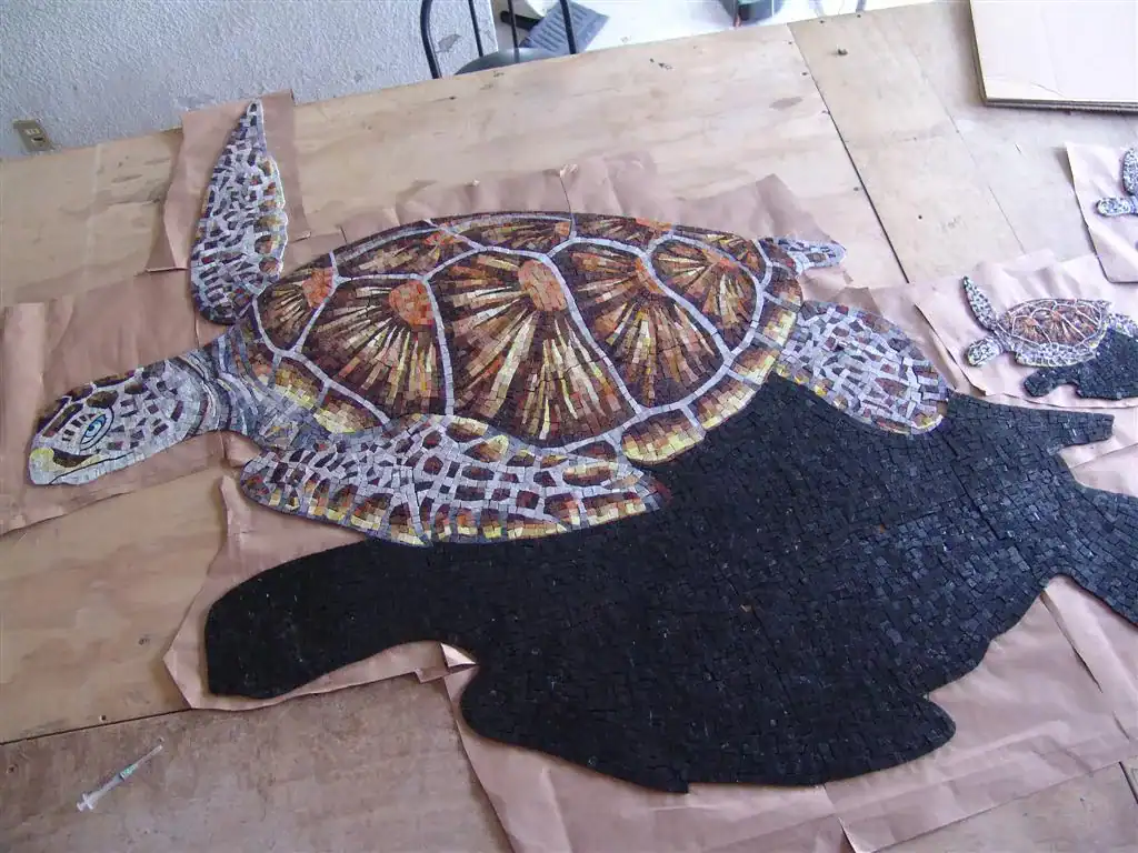Mosaic turtle pool mosaic in progress at Mosaiclegs Art Studio. Custom design for unique swimming po.