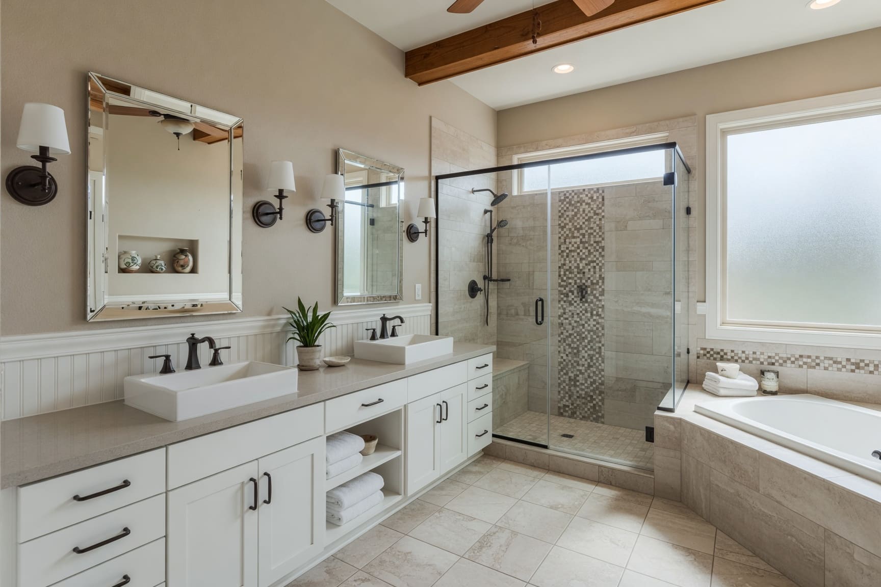 Primary bathroom with double vanity and walk-in shower