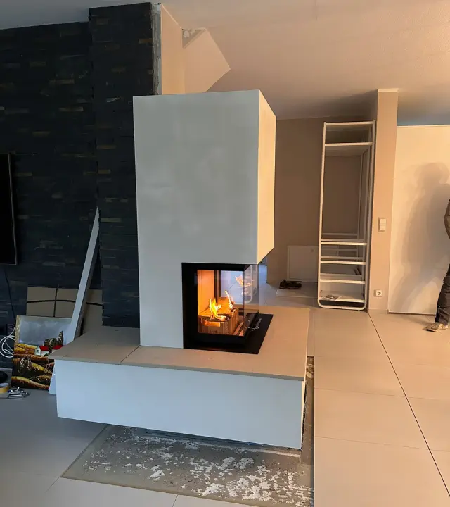 Wohnkomfort mit Kamin – Projektansicht von Fliesenleger Eduard Repp