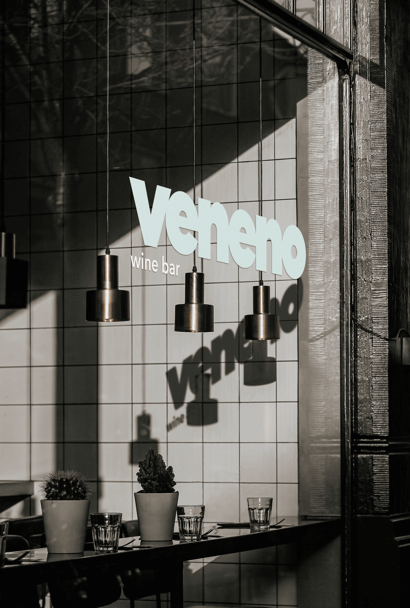 Shop front window of a wine bar with logo displayed in large