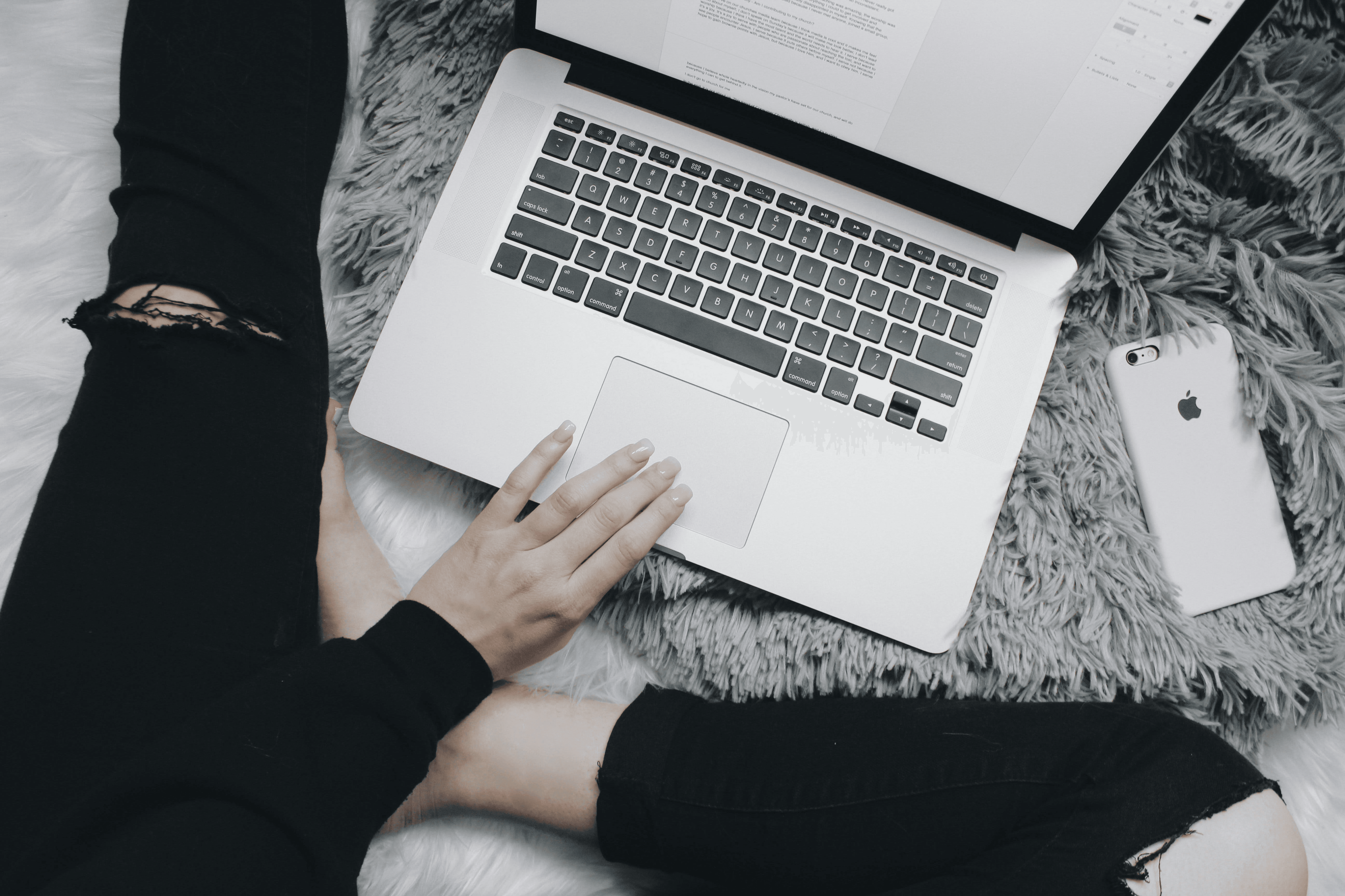Woman working on laptop -  Faceless Instagram Content Ideas