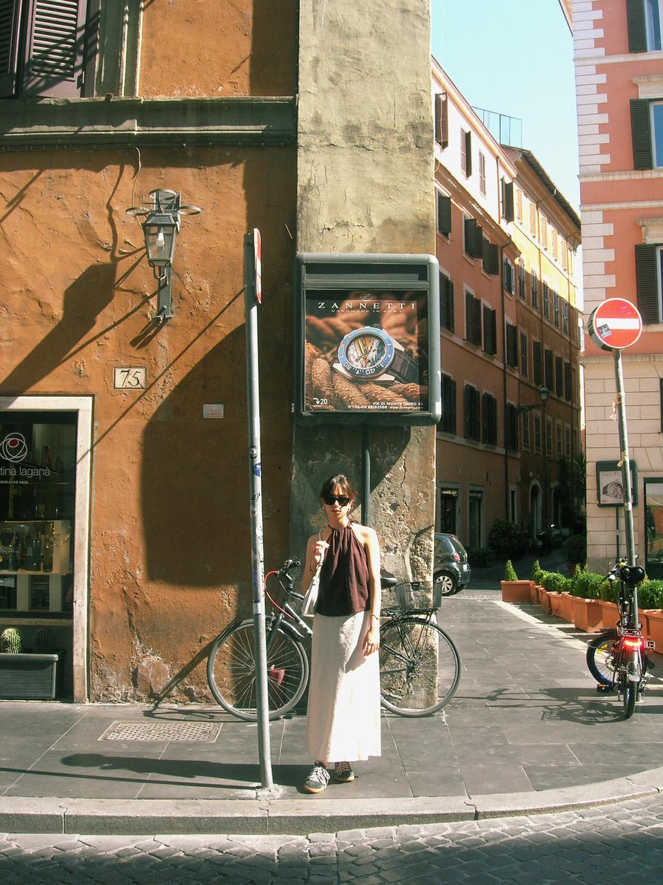 a blurry photo of a person standing in front of a wall
