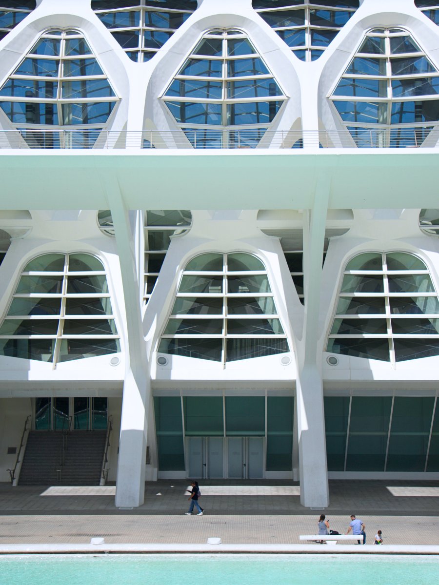 three brown wooden boat on blue lake water taken at daytime