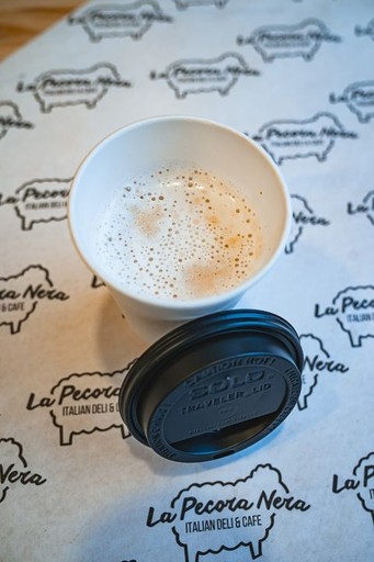 a vanilla ice cream with matcha cream served in a white plate